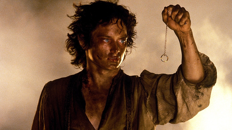 Frodo holding the One Ring in The Return of the King (2003)